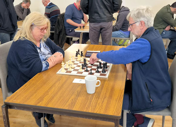 Two people playing chess