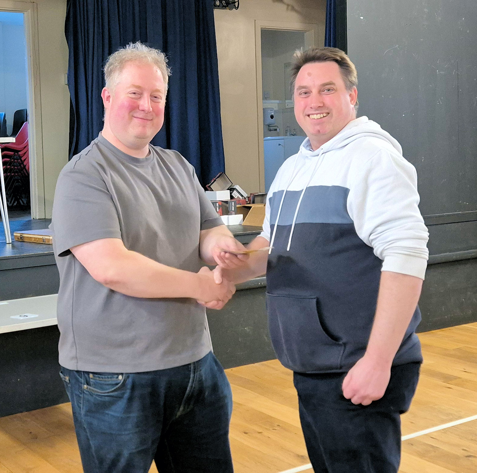 Rob Scott receives his trophy for the 2026 DCCA Individual Blitz