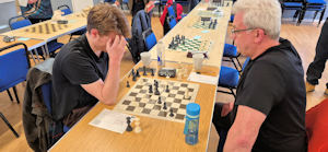 Two people playing chess