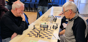 Two people playing chess